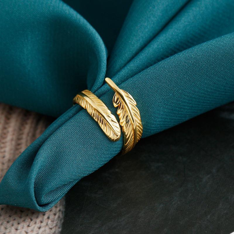 Adjustable Golden Plume Ring